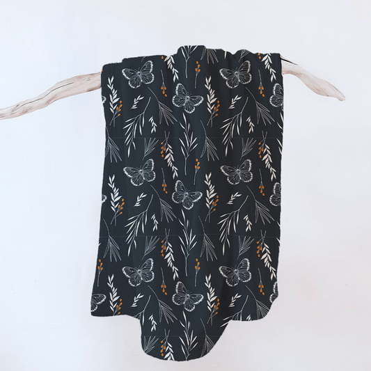 Velveteen plush throw blanket with butterfly pattern on a white background, branded as Driftwood Corner Co.